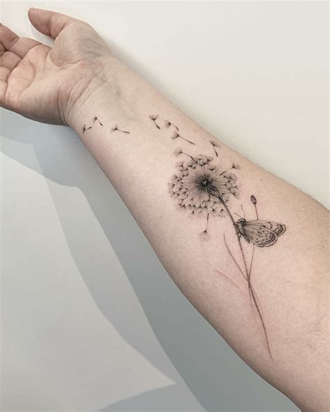 dandelion hand tattoo|dandelion and butterfly tattoo meaning.